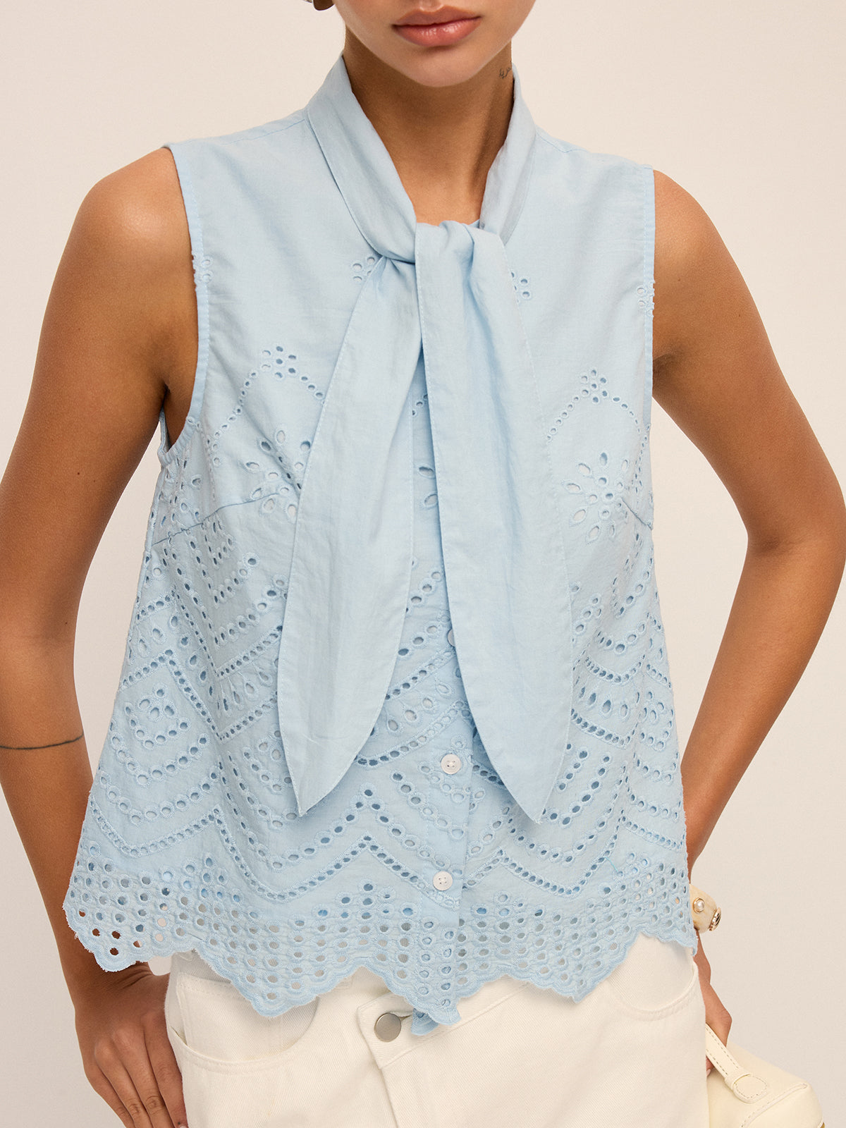 Tie-Neck Eyelet Embroidery Sleeveless Blouse